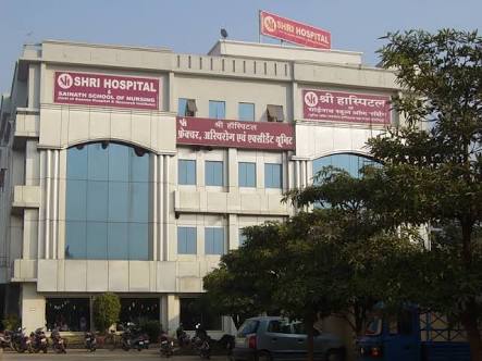 an image containing an entrance gate with 'Shri Hospital, NH7 Road katni, Madhya Pradesh'
